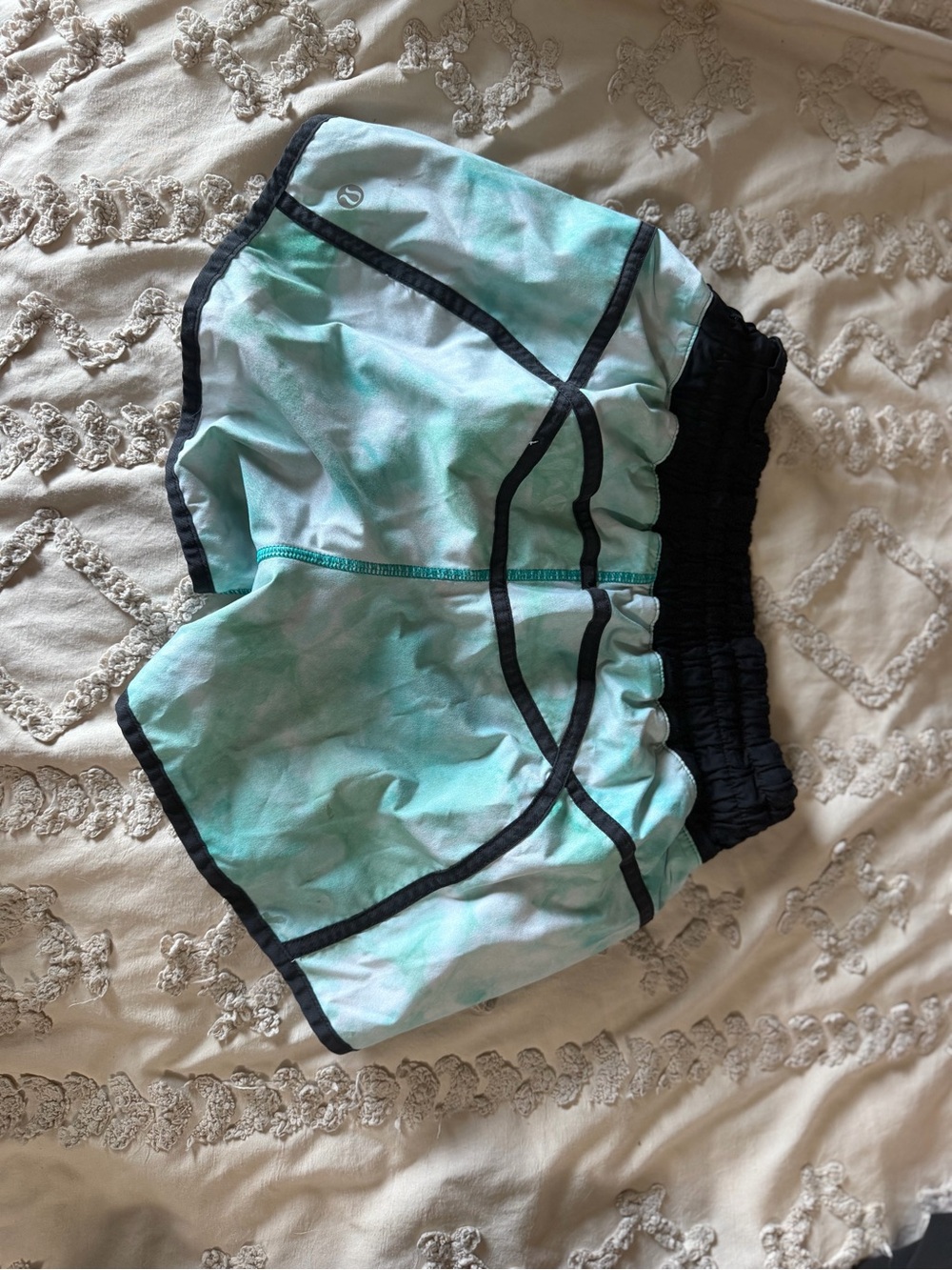 lululemon aqua tie-dye running shorts with black trim